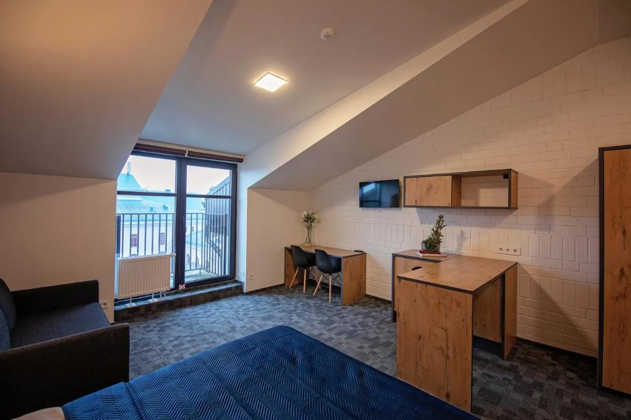 Guest lounge under the roof — LOFT INN Vilnius
