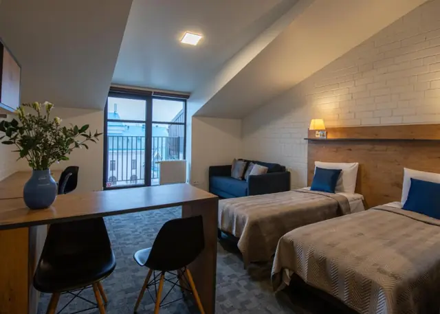 Economy quadruple room — LOFT INN Vilnius