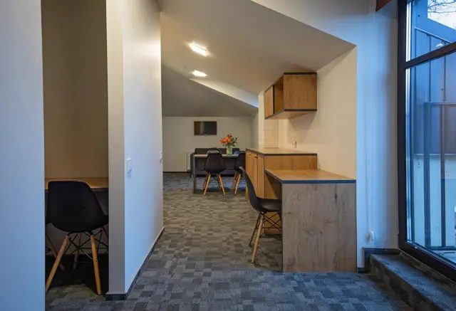 Shared guest kitchen — LOFT INN Vilnius