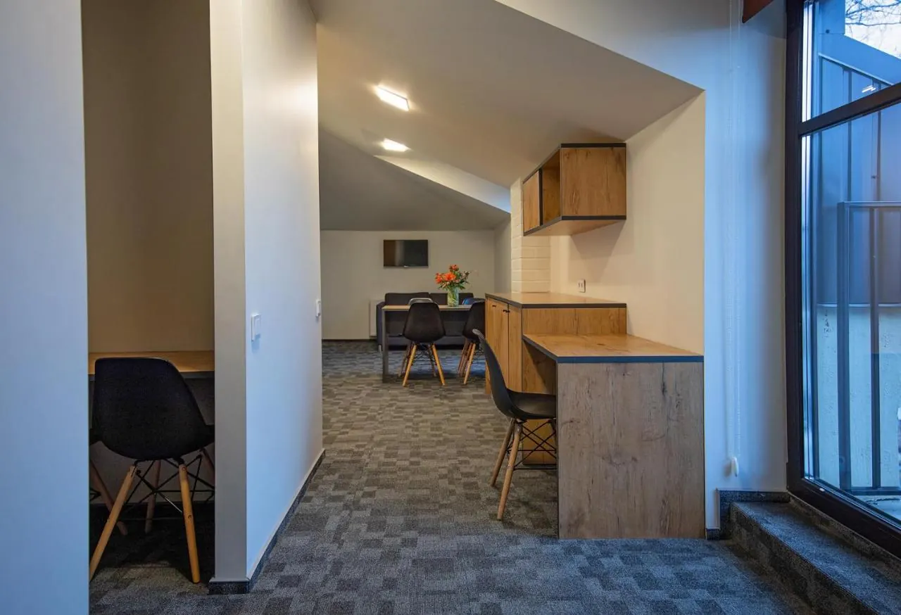 Shared guest kitchen — LOFT INN Vilnius