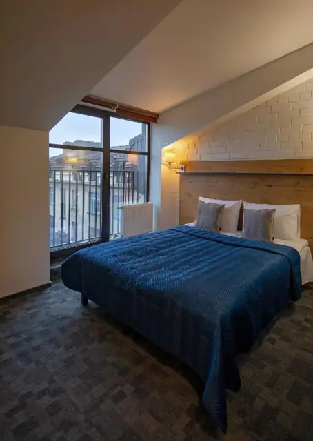Double room with a queen bed — LOFT INN Vilnius