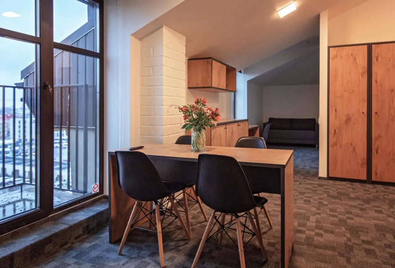 Shared guest kitchen — LOFT INN Vilnius