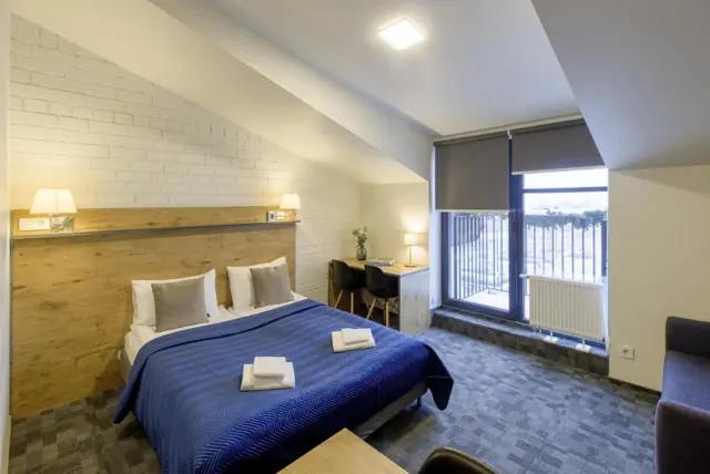 Double room with a queen bed — LOFT INN Vilnius