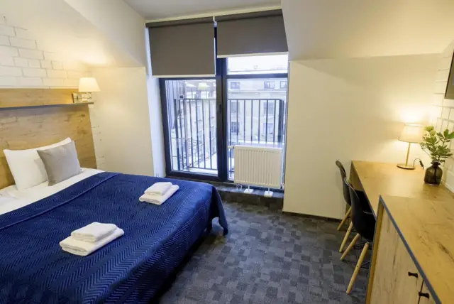 Double room with a queen bed — LOFT INN Vilnius